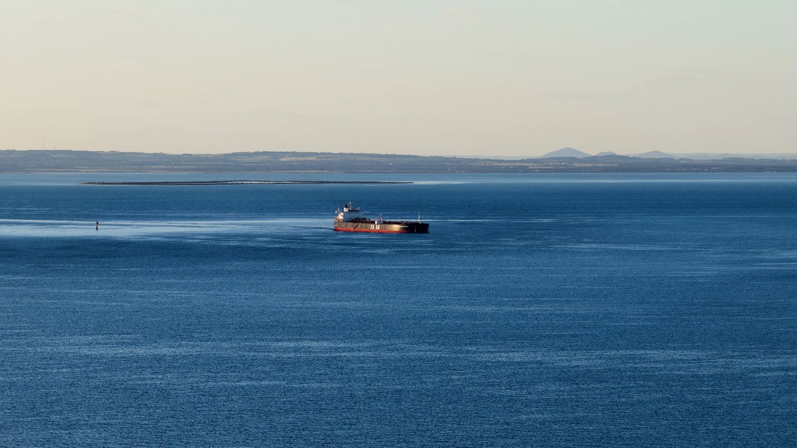 Oil tanker at sea seen from above